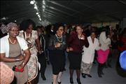 Deputy minister dancing with other women after the Minister`s address